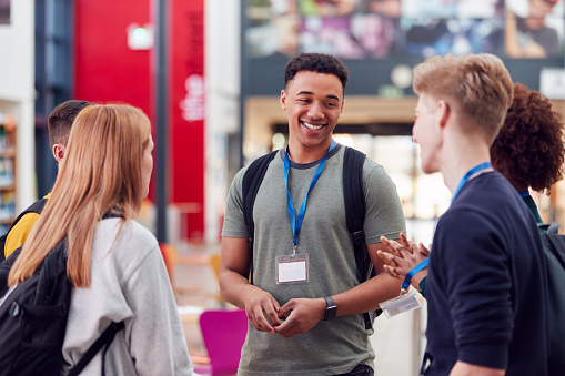 students talking at orientation at a UK university