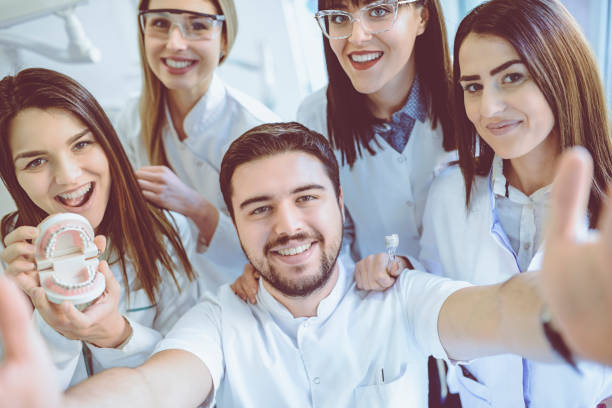group of dentists students make selfie in clinic - aluno dentista imagens e fotografias de stock