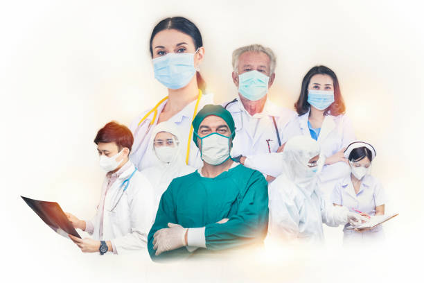 Group of doctors and nurse with face masks stock photo