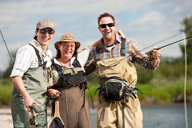 Group of Excited Friends Fishing stock photo