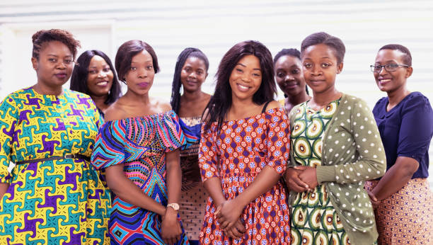 Group of Female African Girls in Traditional Clothing, Smiling at the Camera stock photo