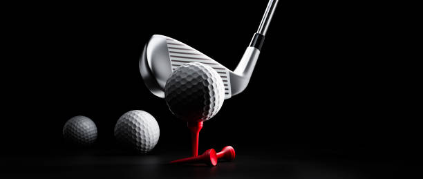 Group of golf balls with driver and red tee stock photo