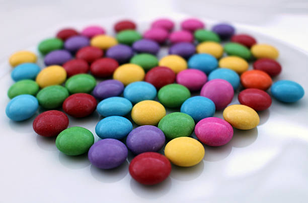 Group of many colorful tasty chocolate candies stock photo