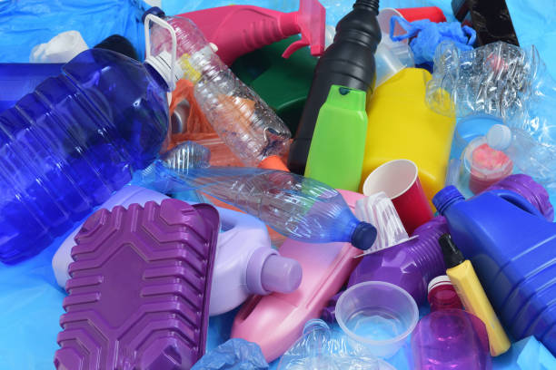 group of plastic containers on blue plastic bags stock photo