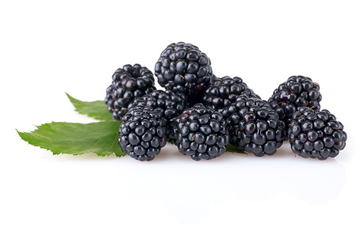 Pile of Blackberries with Leaf isolated on white background.