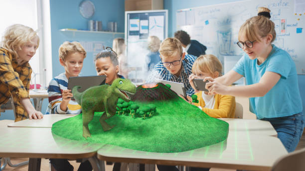 Group of School Children Use Digital Tablet Computers with Augmented Reality App, Looking at Educational 3D Animation - Dinosaur Walking on Island with Active Volcano. VFX, Special Effects Render Group of School Children Use Digital Tablet Computers with Augmented Reality App, Looking at Educational 3D Animation - Dinosaur Walking on Island with Active Volcano. VFX, Special Effects Render digital animation stock pictures, royalty-free photos & images