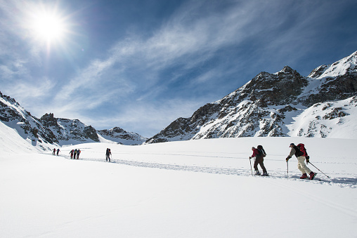 Group of skiers in Alps – free photo on Barnimages