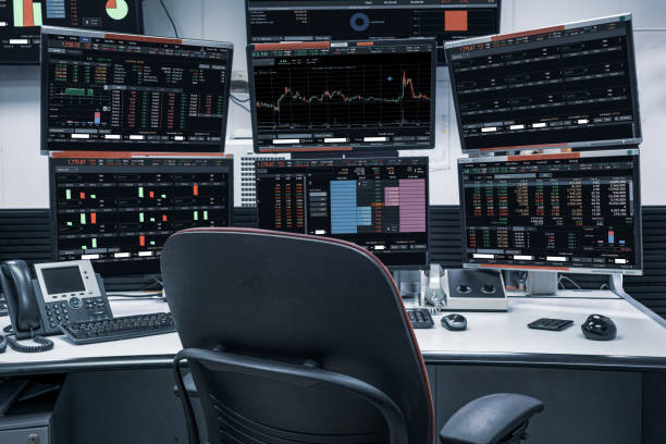 group of stock data monitor analyzing data stock market in monitoring room on the data presented in the chart, forex trading graph, stock exchange trading online, financial investment stock photo