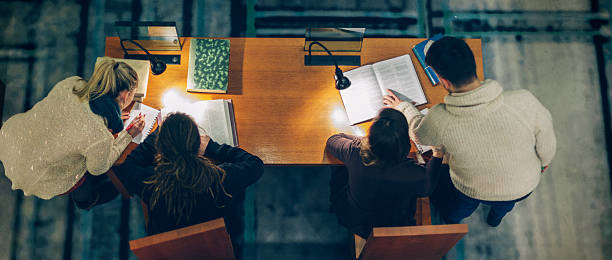 Group of Students Studying in a Library stock photo