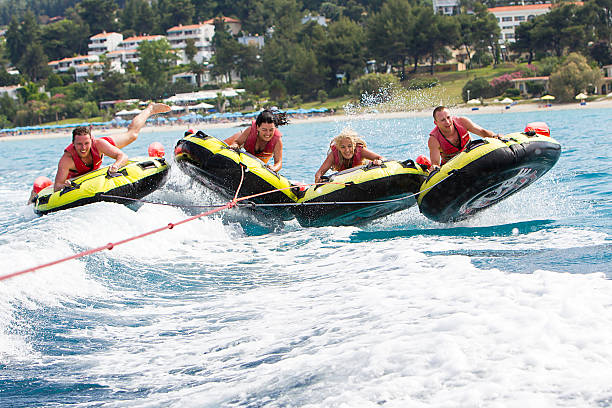 Group of unrecognized people doing water sport, in Halkidiki stock photo