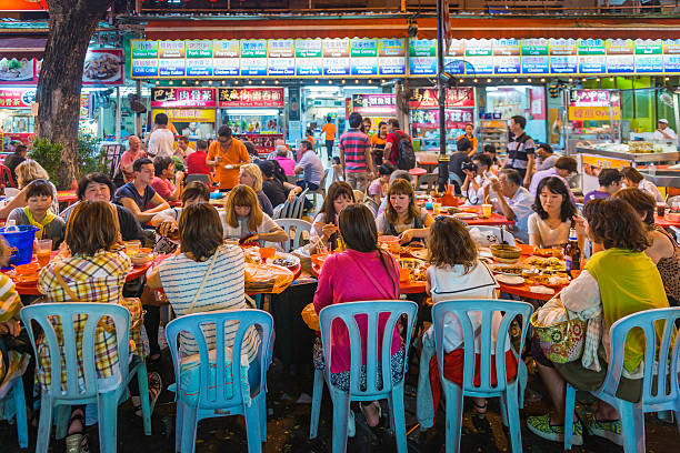 Malaysian Family Dining Stock Photos, Pictures & Royalty-Free Images