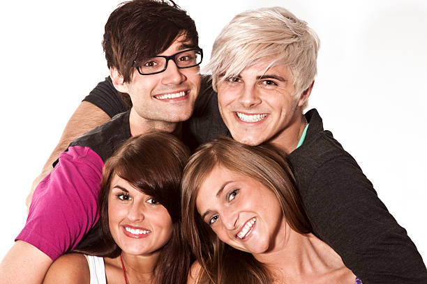 Group of Young Adults Hugging and Laughing stock photo