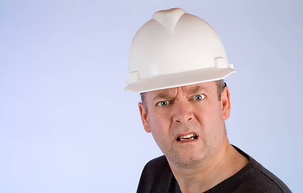Grumpy Construction Worker stock photo