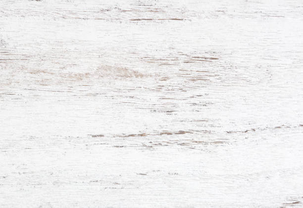 Grunge background. Peeling paint on an old wooden table. White wooden texture for background.  Top view. stock photo