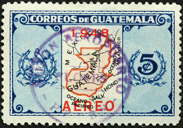 Guatemala map on an old stamp stock photo