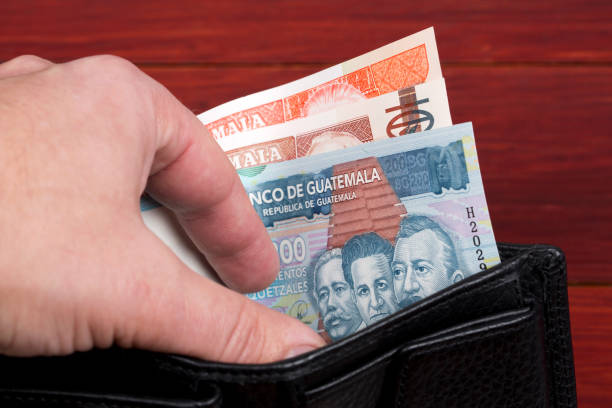 Guatemalan money in the black wallet stock photo