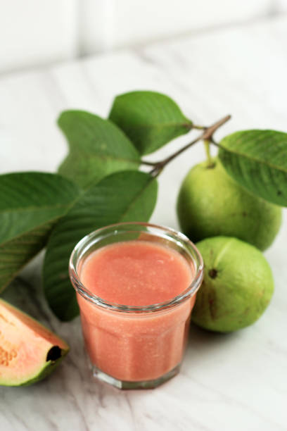 Guava Red Juice on Glass, Healthy Diet Concept stock photo