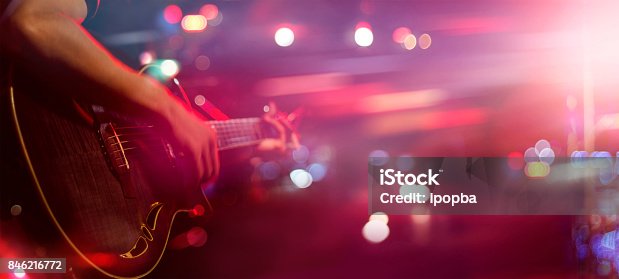 istock Guitarist on stage for background, soft and blur concept 846216772