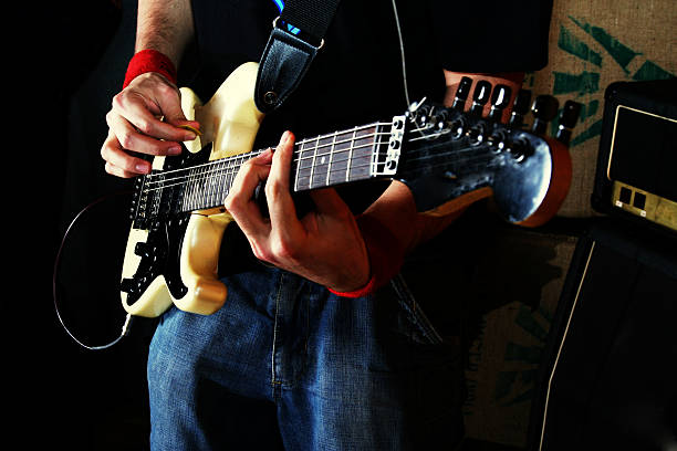 Guitarist play rock guitar stock photo