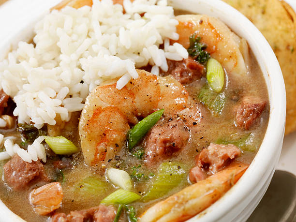 Gumbo Creole Style Shrimp and Sausage Gumbo with white rice- Photographed on Hasselblad H3D2-39mb Camera gumbo stock pictures, royalty-free photos & images