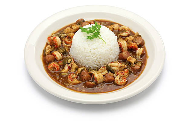gumbo with crawfish, chicken & sausage gumbo with crawfish, chicken & sausage, southern food in the united states okra plants pics stock pictures, royalty-free photos & images