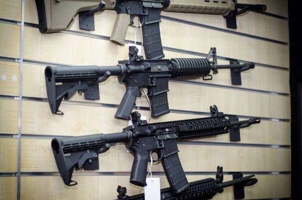 Gun wall rack with rifles stock photo