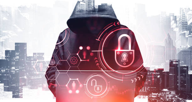 Hacker with laptop in city, security Unrecognizable young hacker in hoodie using laptop in blurry city. Concept of cybersecurity. Toned image. Double exposure of security interface computer crime stock pictures, royalty-free photos & images