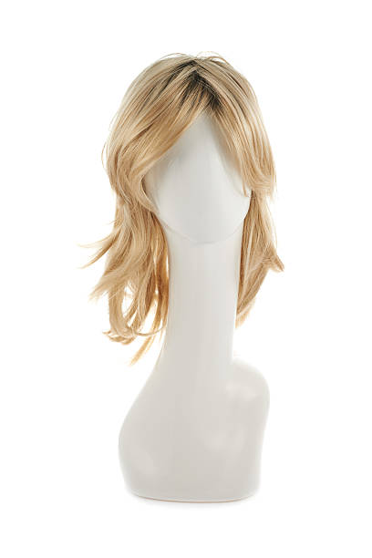 Hair wig over the mannequin head Wavy hair wig over the white plastic mannequin head isolated over the white background wig stock pictures, royalty-free photos & images