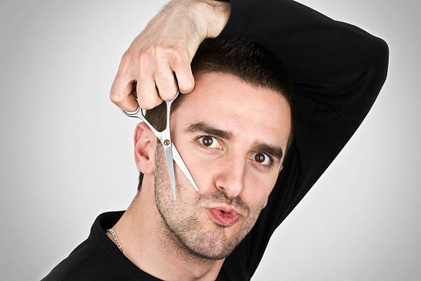 Hairdresser Crazy hairdresser with scissors lepro stock pictures, royalty-free photos & images