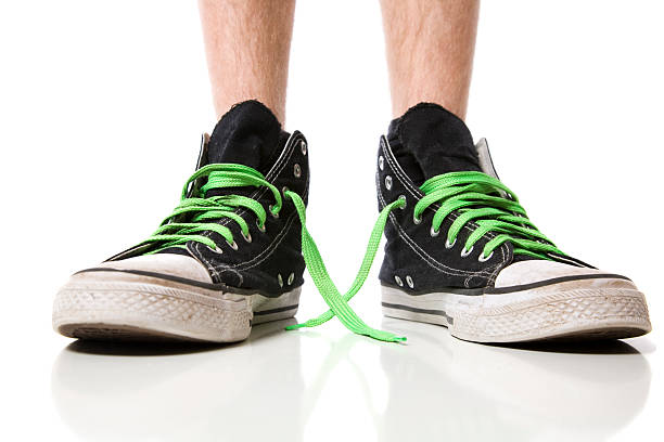 Untied Sneaker Stock Photos, Pictures & Royalty-Free Images - iStock