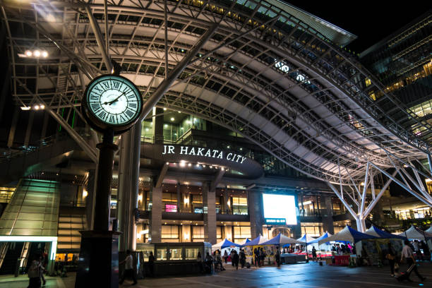 Hakata Station illuminated at night stock photo