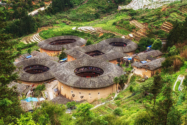 Hakka Tulou Hakka Tulou traditional Chinese housing in Fujian Province of China earthenware stock pictures, royalty-free photos & images