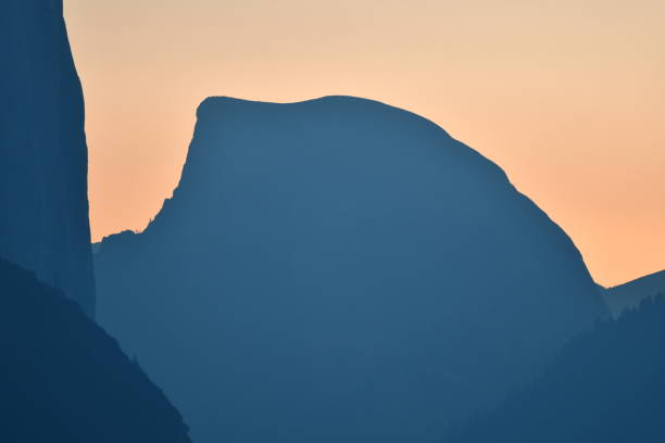 Half Dome at Sunrise Early Morning Light with Yosemite Valley and Haze from Wildfires steven harrie stock pictures, royalty-free photos & images