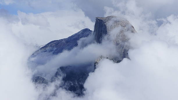 Half Dome in the Clouds stock photo