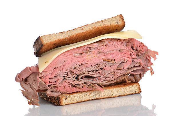 Half Sandwich roast beef sandwich on rye isolated white background roast beef sandwich stock pictures, royalty-free photos & images