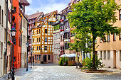 istock Half timbered buildings in the picturesque Old Town of Nuremberg, Germany 1168481466