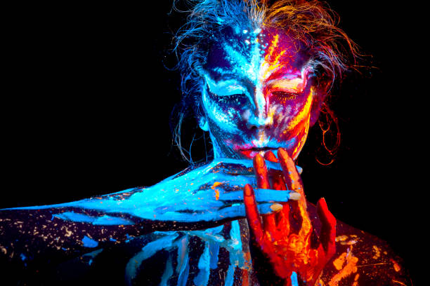 UV halloween body art mix ice an fire hot cold  glowing portrait stock photo