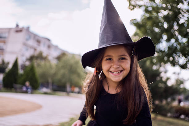 Halloween is her favourite holiday and she always have interesting costumes stock photo