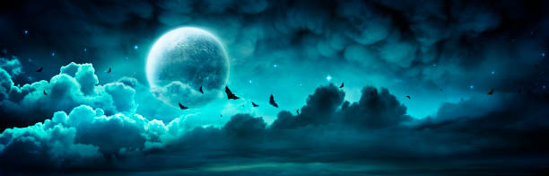 Halloween Night - Spooky Moon In Cloudy Sky With Bats Halloween Night - Spooky Moon In Cloudy Sky With Bats aqua menthe photos stock pictures, royalty-free photos & images