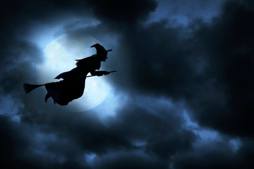 Witch flying on broom on spooky Halloween night.To see more of my Halloween images, click on the link below: