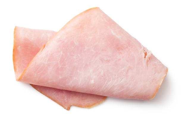 Ham Slice Isolated on White Background Ham slice isolated on white background. Smoked pork. Top view ham stock pictures, royalty-free photos & images
