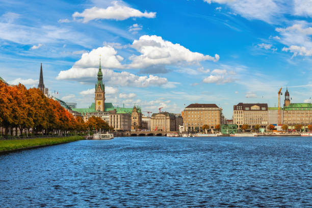 Hamburg Germany, city skyline at Alster with autumn foliage season Hamburg Germany, city skyline at Alster with autumn foliage season hamburg germany stock pictures, royalty-free photos & images