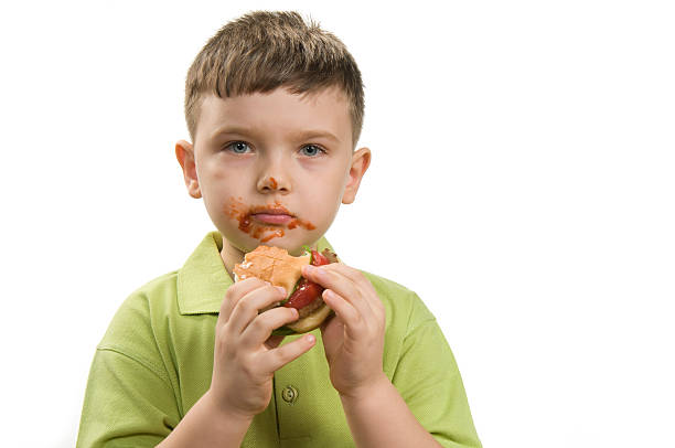 Hamburger and The Boy  ketchup smear stock pictures, royalty-free photos & images