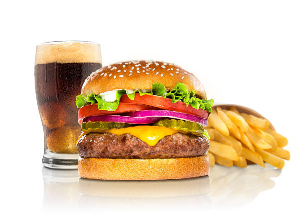 Hamburger fries soda pop cheeseburger combination deluxe fast white stock photo
