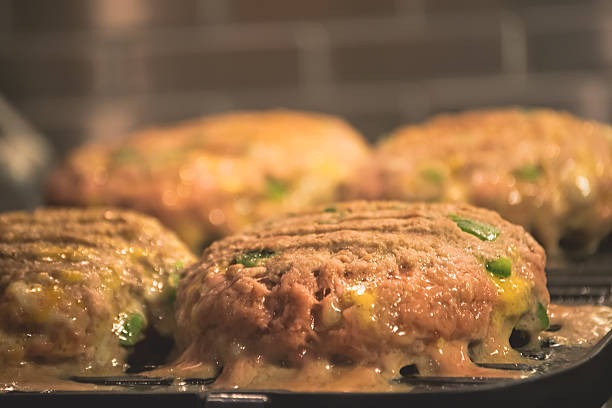 Hamburger Turkey Meat on Grill stock photo