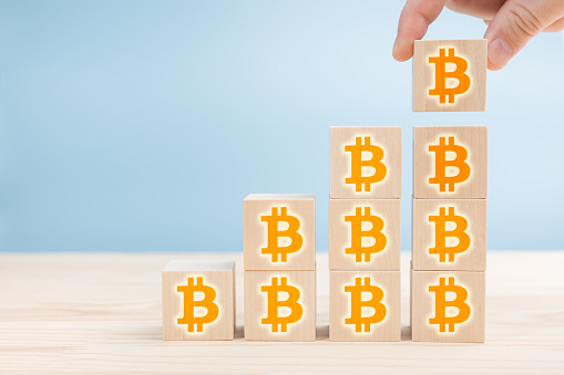 hand arranging wood block cubes with bitcoin icon growth of bitcoin picture id1291550686?b=1&k=20&m=1291550686&s=170667a&w=0&h=2OQ6KwdU 6BB0Cu 8nS5zYE wDrrigDME58bX20tYVE=