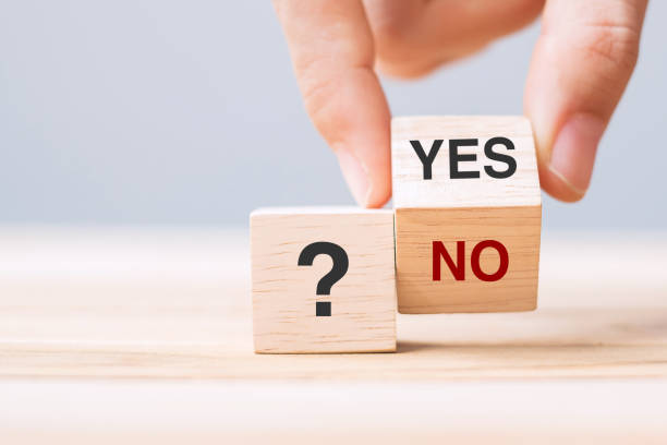 Hand change Yes or No block. Answer, question and decision concept stock photo