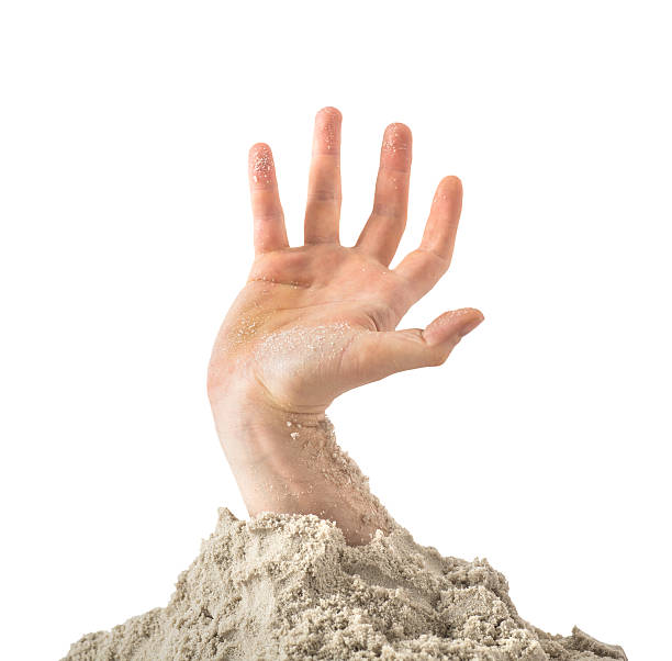 hand help in heap of sand isolated on white hand help in heap of sand isolated on white buried stock pictures, royalty-free photos & images