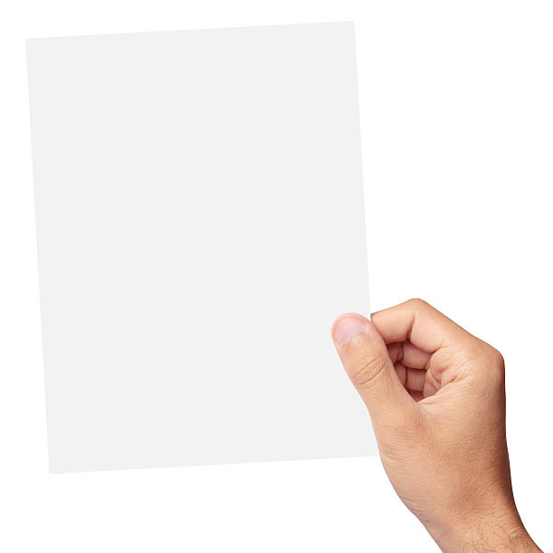 Hand holding a blank piece of paper stock photo