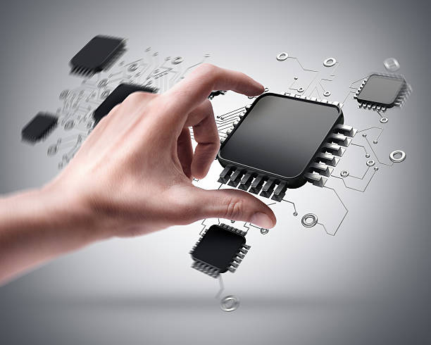 hand holding CPU chip stock photo